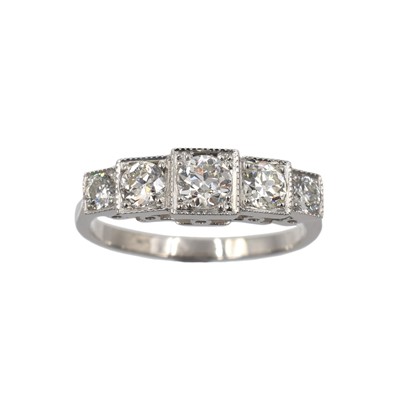 Lot An Art Deco style 0.90ct five-stone diamond box-set ring, set in platinum