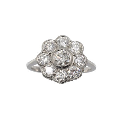 Lot A diamond and platinum daisy cluster ring