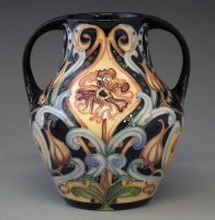 Lot 245 - Moorcroft twin handled vase   decorated with