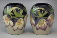 Lot 250 - Pair of Moorcroft purple helibore vases (boxed).