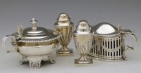 Lot 299 - Two silver mustard pots and two peppers.