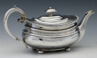 Lot 300 - George III silver tea pot.