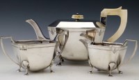 Lot 302 - Silver three piece silver tea set with ivory