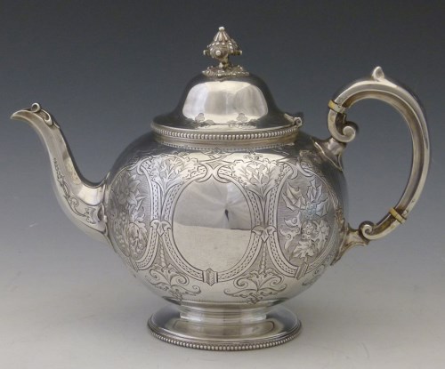 Lot 303 - Silver tea pot.