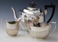 Lot 317 - Three piece silver tea set (matched).