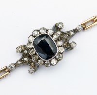 Lot 326 - Sapphire and diamond oval cluster bracelet.
