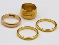Lot 363 - Two 900 gold plain band rings, 585 ring and