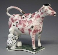 Lot 113 - Cow creamer and cover with Milkmaid.