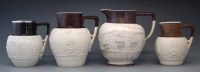 Lot 117 - Four Stoneware sprig moulded jugs