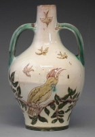 Lot 152 - Della Robbia twin handled vase   incised with