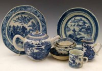 Lot 192 - Nine pieces of Chinese export porcelain including a teapot, lidded jug,   plate, bowl, coffee can and bowls.
