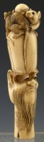 Lot 198 - Japanese ivory carved handle of rats on a head.