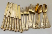 Lot 219 - Suite of gilt kings pattern flat ware H & Co.