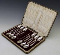 Lot 227 - Cased set of twelve silver tea spoons and a pair