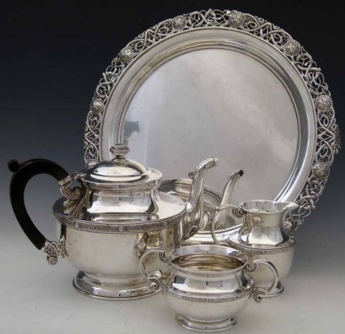 Lot 234 - Irish silver three piece tea set and matching