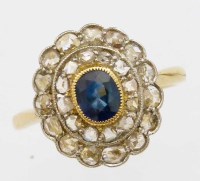 Lot 258 - Sapphire and diamond oval cluster ring, the