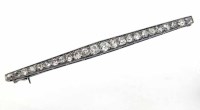 Lot 287 - French diamond bar brooch.