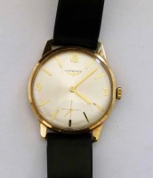 Lot 299 - Longines gold wristwatch.