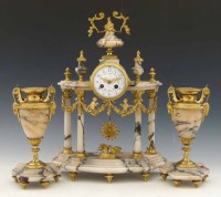Lot 421 - Three piece French clock set.