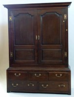 Lot 442 - George III oak livery cupboard.
