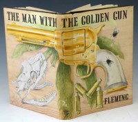 Lot 88 - Fleming, I., The Man With The Golden Gun, 1965, first edition, black cloth, slight spotting to the top edge, small chips to the wrapper, pages clean w