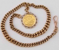 Lot 230 - 1911 gold sovereign mounted in a 9ct double watch