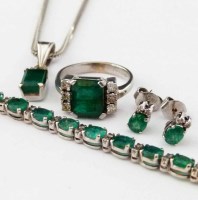 Lot 239 - Emerald and diamond ring line bracelet; pendant
