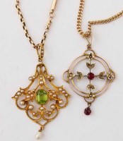 Lot 269 - Seed pearl and peridot pendant on chain and garnet and pearl pendant.