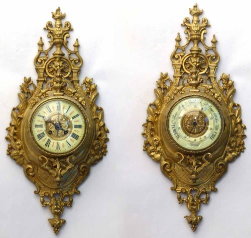 Lot 502 - Pair of brass barometers.