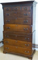 Lot 525 - George III oak chest on chest.