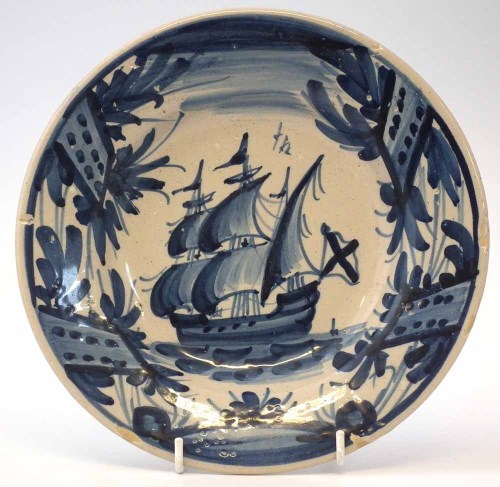 Lot 96 - Spanish faience plate   painted in blue with a