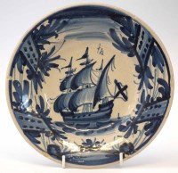 Lot 96 - Spanish faience plate   painted in blue with a