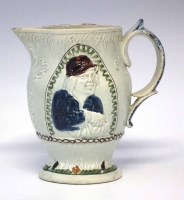 Lot 123 - Pratt ware Miser jug circa 1800   with moulded