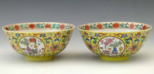 Lot 321 - Pair of yellow ground famille rose medallion bowls.
