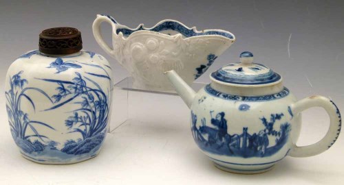 Lot 353 - Chinese sauceboat after a Bow original, also an octagonal vase, and a teapot