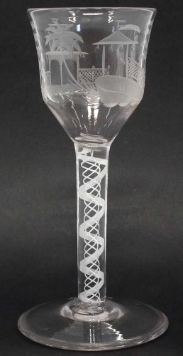 Lot 112 - Wine glass with figures.