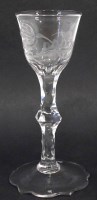 Lot 114 - Facetted stem wine glass.