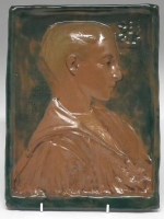 Lot 234 - Della Robbia Conrad dresser plaque.