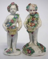 Lot 103 - Two figures of cherubs by Bow and Derby 1760