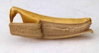 Lot 249 - Ivory carving of a banana.
