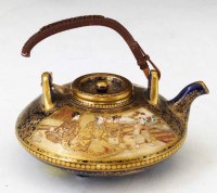 Lot 251 - Japanese Satsuma miniature teapot.