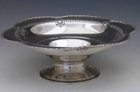 Lot 276 - Lobed silver footed dish.