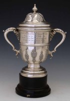 Lot 282 - Lidded two-handled silver trophy cup (weighted) with stand