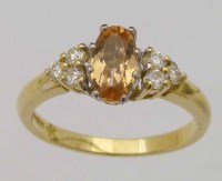 Lot 311 - Citrine and diamond ring