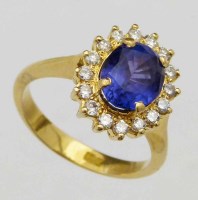 Lot 318 - Tanzanite and diamond oval cluster ring