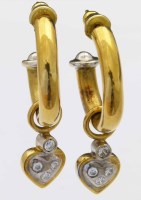 Lot 319 - Unmarked gold and diamond hoop earrings.