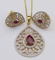 Lot 324 - Ruby and diamond necklace and ear studs