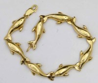 Lot 348 - 14k gold dolphin bracelet.