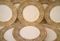 Lot 131 - Twelve Royal Doulton gilded plates.