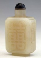 Lot 218 - White jade rectangular snuff bottle carved with Shou